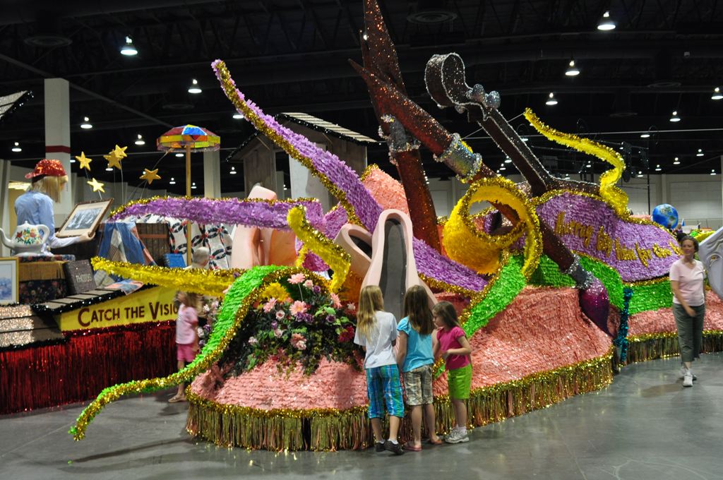 Young Girls Examine a Float