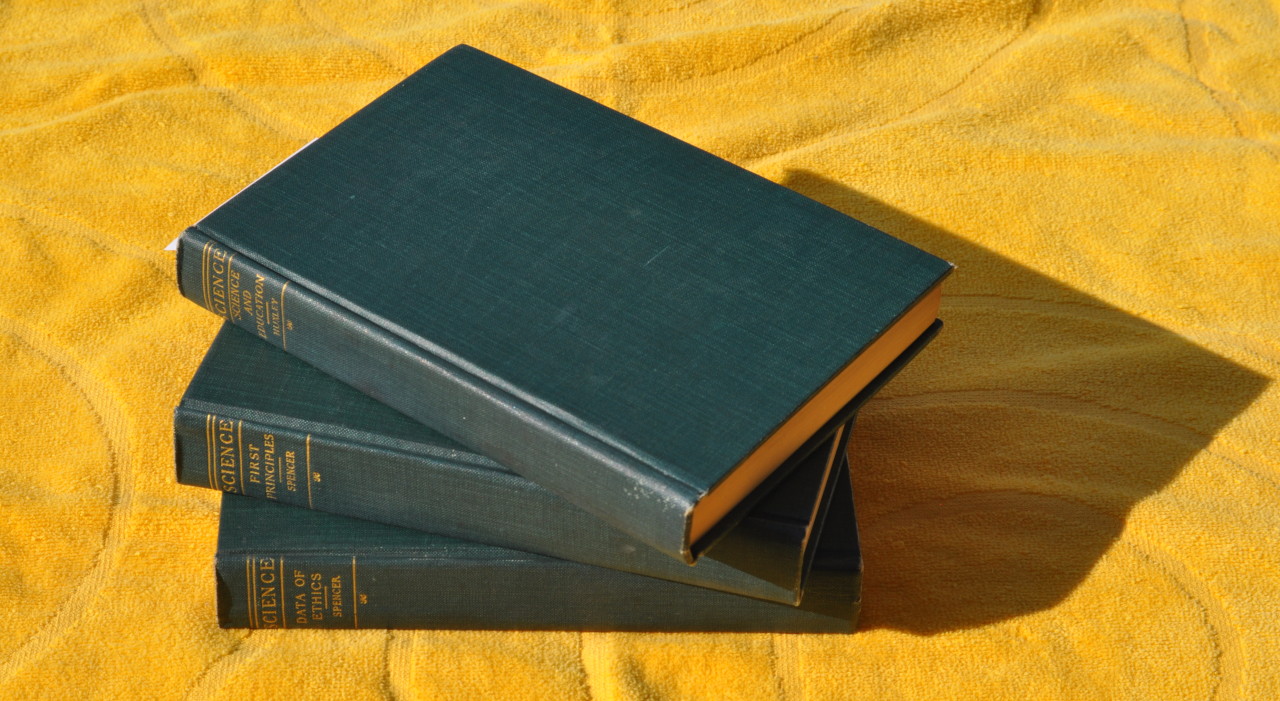 Book on Yellow Background